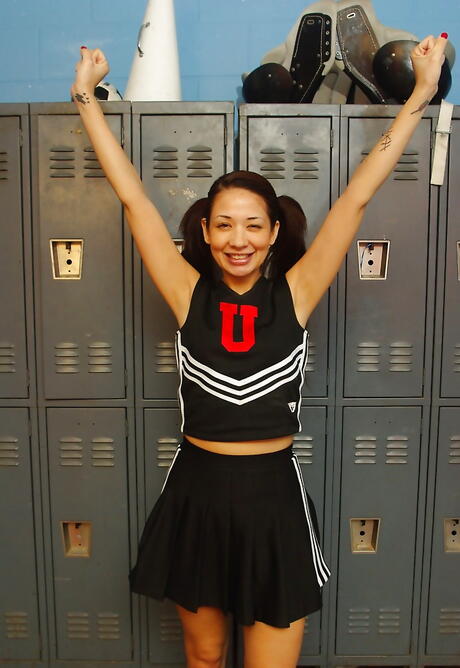 Attractive oriental milf Coco Velvet shows her ass 